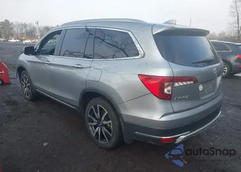 2019 Honda Pilot Touring z USA, uszkodzony, nr VIN 5FNYF6H92KB082566